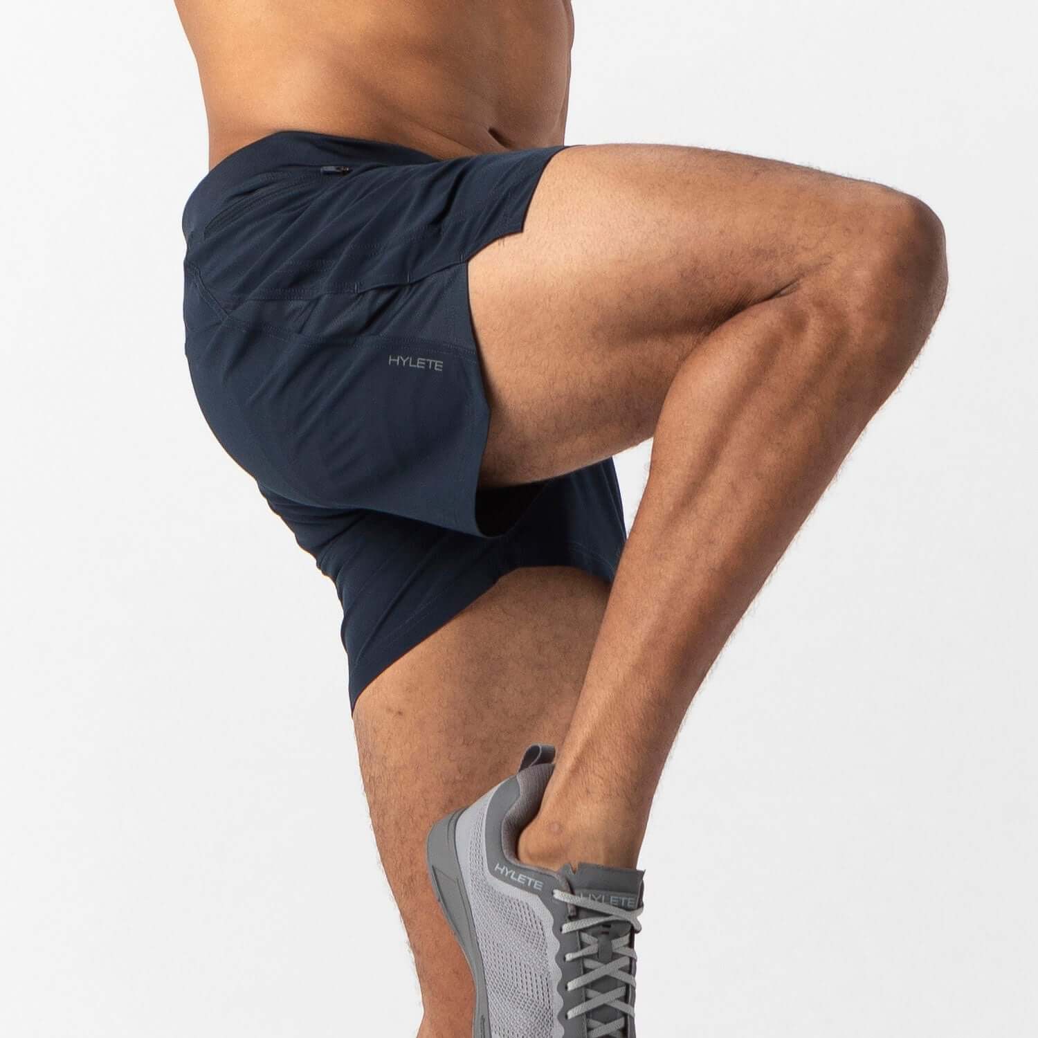 Lightweight navy running shorts with breathable liner, ideal for high-impact workouts and maximum airflow.